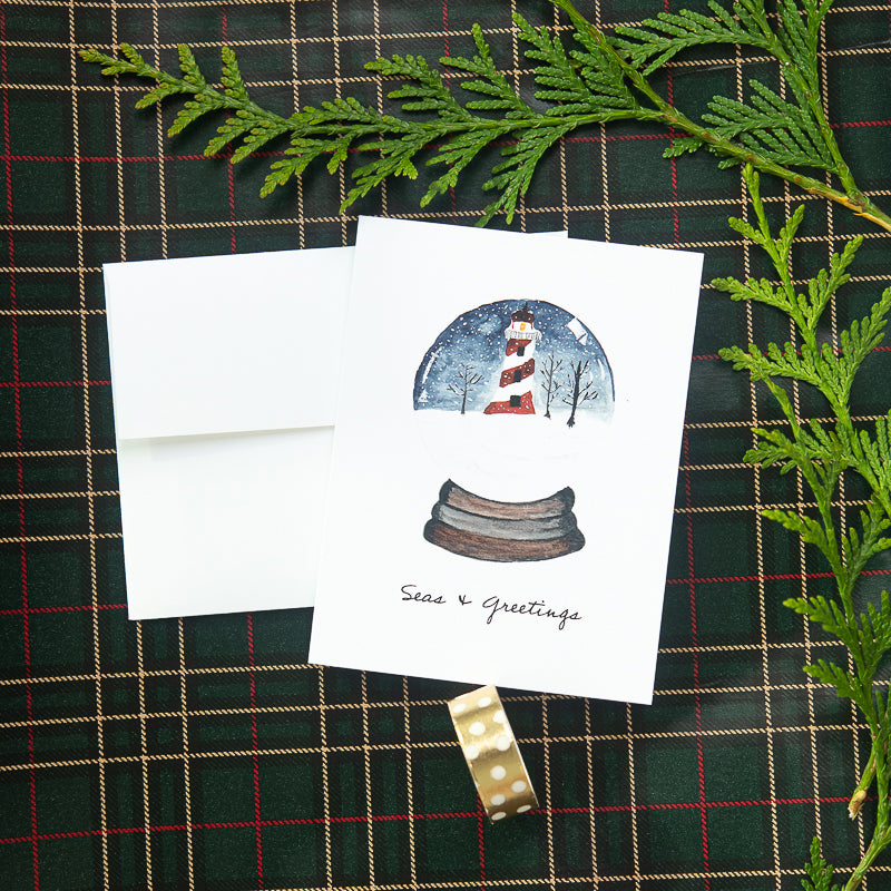 winter lighthouse note card on wrapping paper