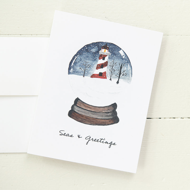 winter lighthouse snow globe