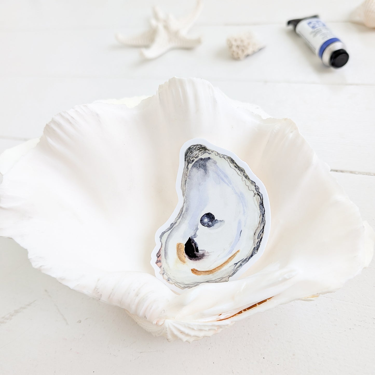 Oyster with Pearl sticker in a shell