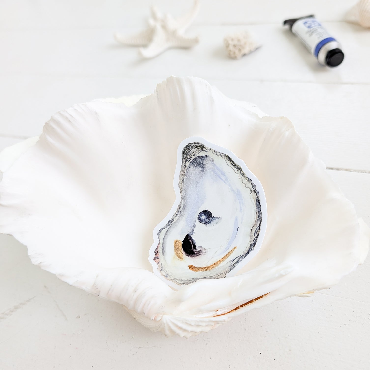 Oyster with Pearl sticker in a shell