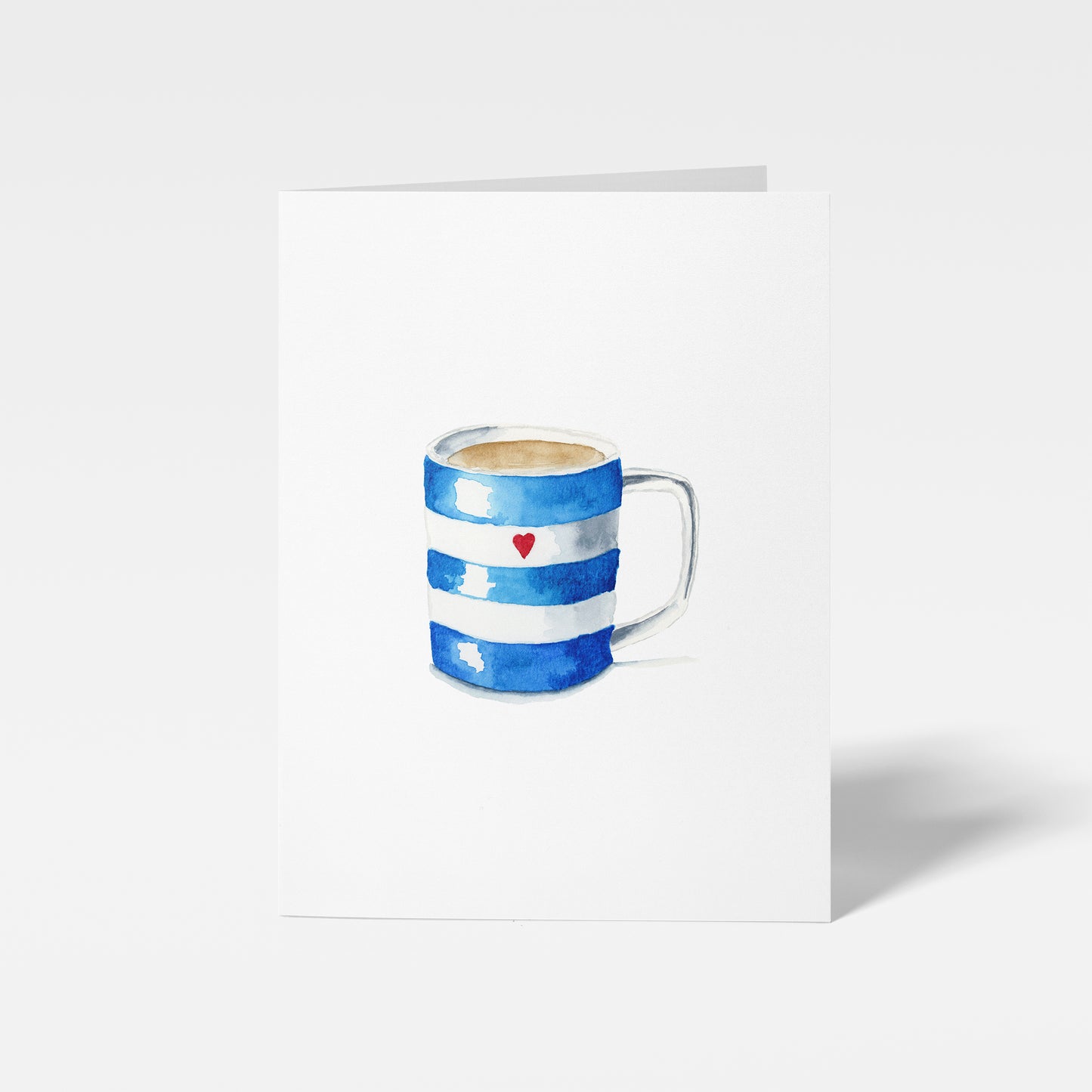 Blue and white striped mug with a red heart on a white background