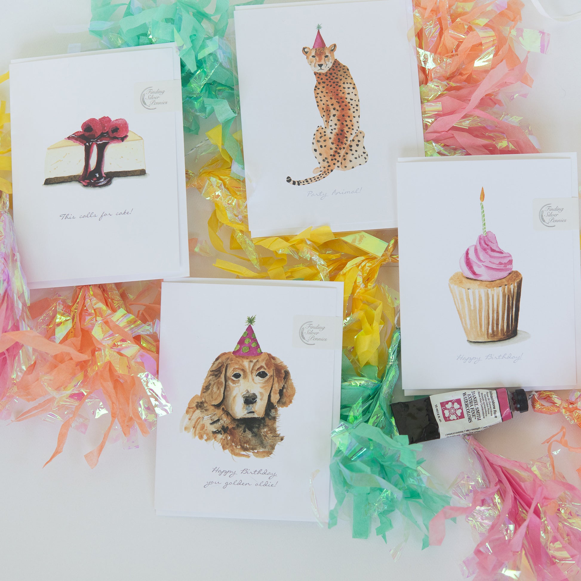 Collection of birthday greeting cards with various designs on a white background